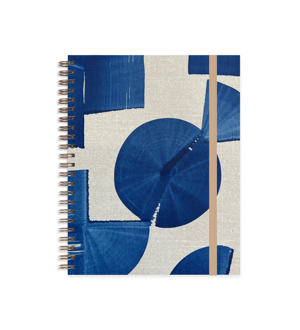 Indigo medium A5 notebook by Moglea with a soft cover and lined pages, ideal for writing and note-taking.