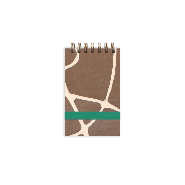 Moglea West Tiny Notebook with soft cover and blank pages, small portable journal for note-taking or sketches.