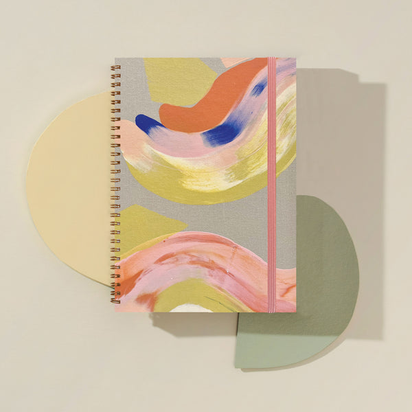 Moglea Citron Composition B5 Notebook with cream paper and soft cover, showcased open with handwritten notes inside.