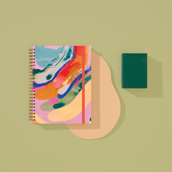 Moglea Palmita Medium A5 Notebook open with lined pages and a soft cover, ideal for note-taking and writing.