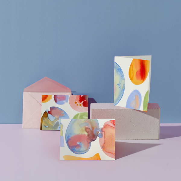 Marble stationery set by Moglea with notebooks, pens, and accessories featuring elegant marble design on a clean surface.