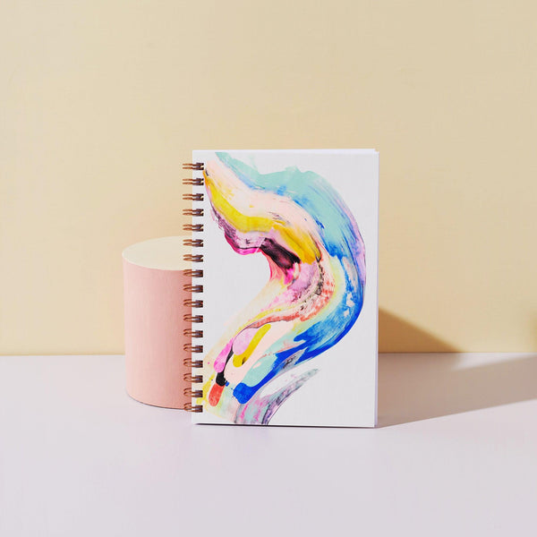 Moglea Candy Swirl Notebook with colorful, swirling cover design and lined pages for writing or journaling.